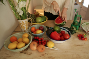 Holistic nutritionist Hanna Evans preparing fruit and vegetables