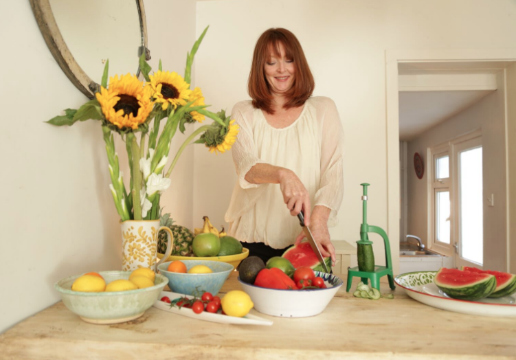 London nutritionist preparing fruit for naturopathic diet plan